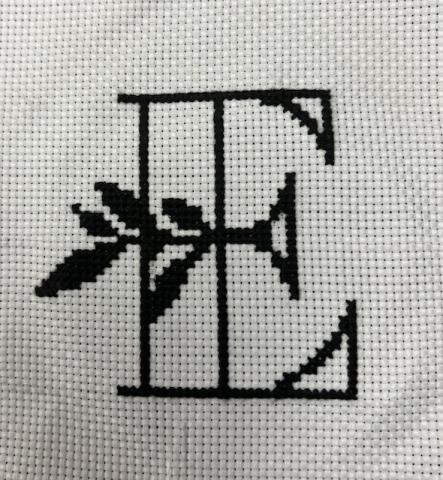 cross stitch of the letter E