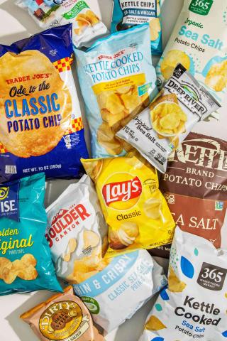 Many bags of potato chips from different brands