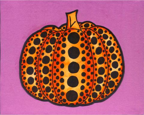 Orange pumpkin on purple background