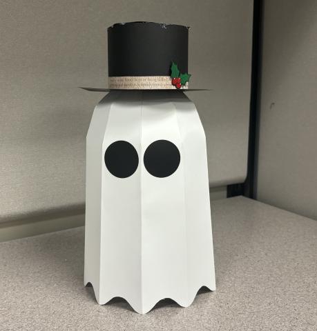 A white paper ghost with a black tophat