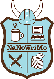 NaNoWriMo logo with a light blue shield outlined in brown with a Viking helmet on top. Coffee, a typewriter, crossed pens, and a stack of paper are featured in each quadrant of the shield.