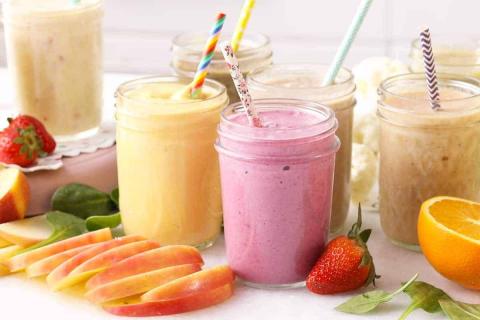 smoothies surrounded by fruit