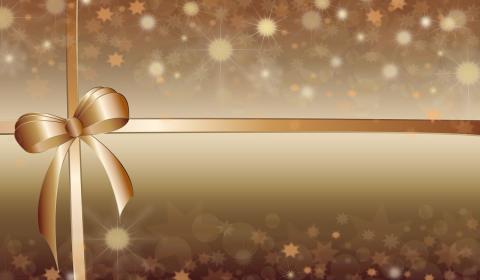 Image of a gold background with sparkles and a gold ribbon tied in a bow