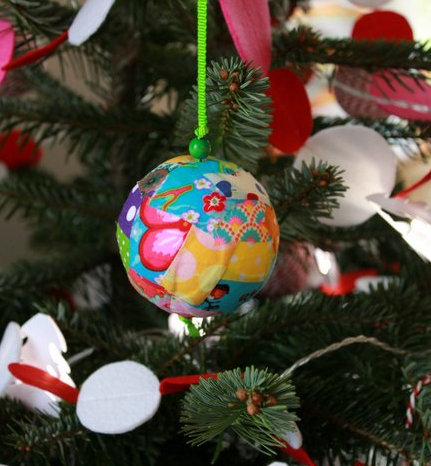 Round colorful ornament in Christmas Tree