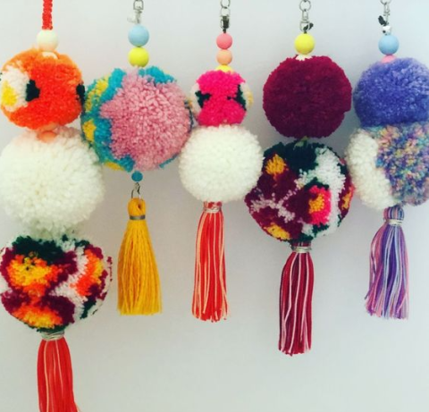 Pom Poms on clips with tassels on the ends