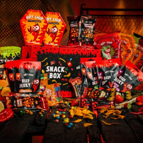 Image of a bunch of bags of snacks that are very spicy.