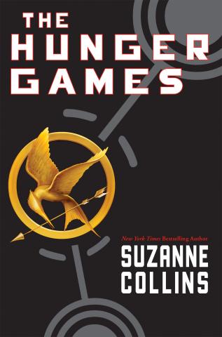 The Hunger Games book cover with a black background and gold mockingjay pin