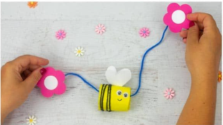 Bumble Bee on a string with flowers