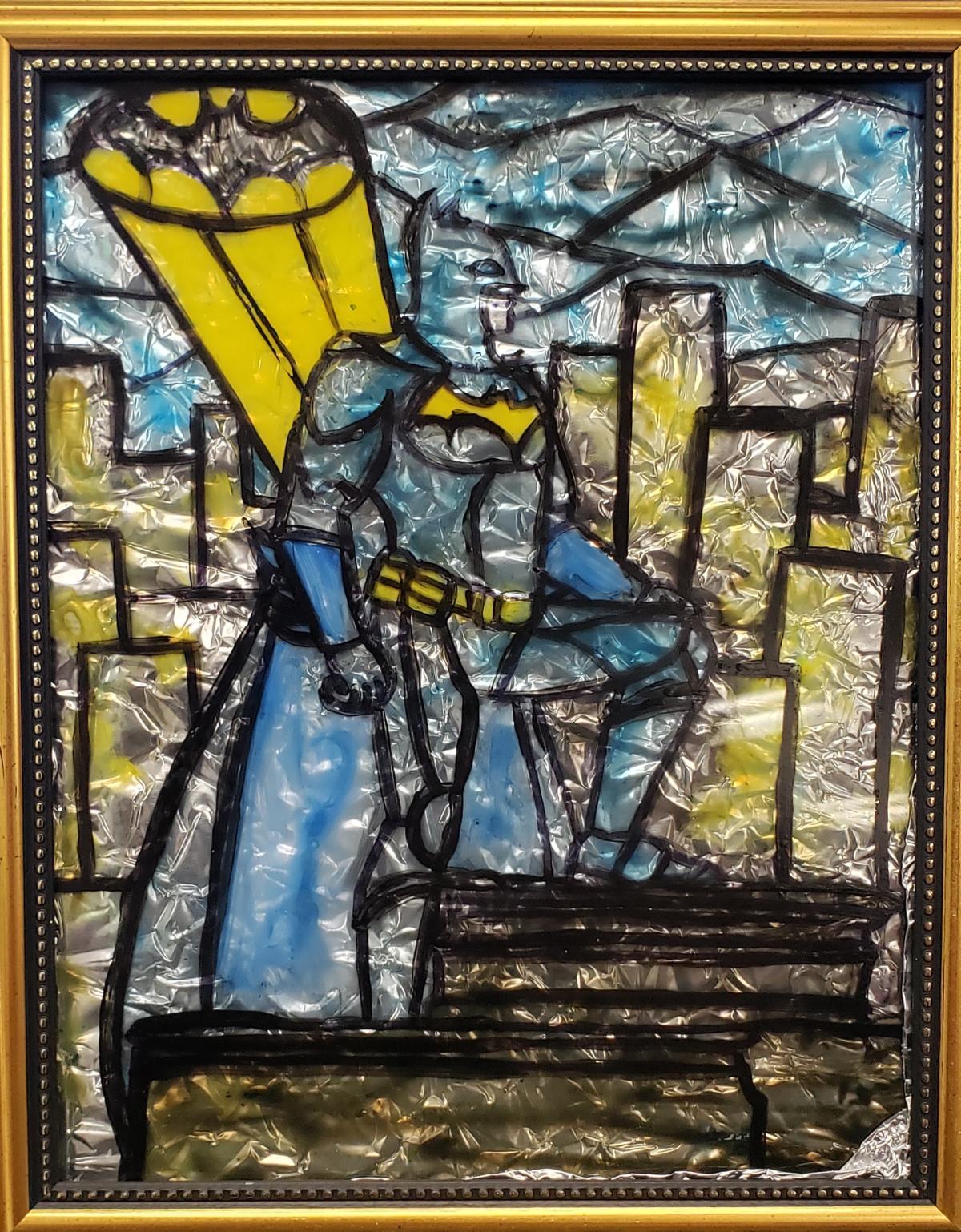 A painted glass image of Batman