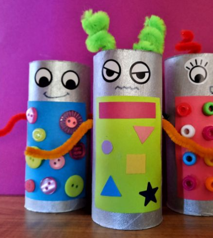 Colorful robots decorated from paper rolls